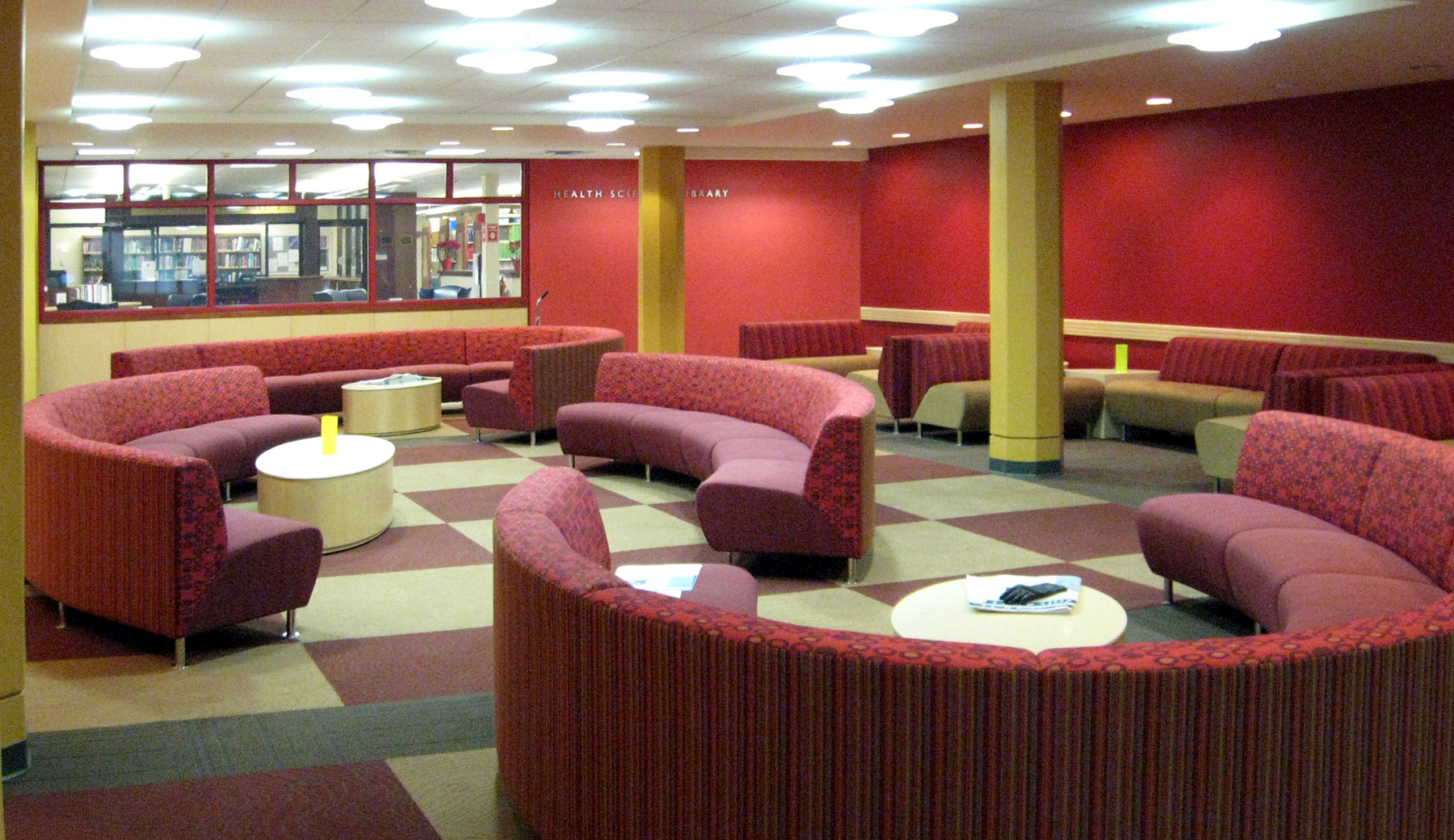 The New York Medical College worked with Lothrop Associates to bring an updated look to their Student Lounge. The design incorporates school colors and movable custom furniture so the room can be reconfigured for other functions.